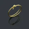 Designer bracelet gold bracelet ladies stainless steel bracelet knot smooth couple bracelet ladies fashion luxury jewelry Valentine s Day jewelry wholesaleq 2024