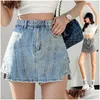 WomenS Shorts Irregar Denim Shorts Rok Dames Lente en zomer Hoge taille Heupbroek Retro Fried Street A-lijn Drop Delivery Verschijnen