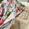 Casual Jurken Runway Zomer Vakantie Prachtige bloemenjurk Dames Stand Mouwloos Enkele rij knopen Riem Bloemenprint Lange vestidos 2024