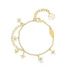 Bracciale designer di lusso Bracciale Donne Lettera di gioiello Plorato smalto oro elegante Piccolo ciondole per fiori Braccialetti uomini Bracciale per braccialetti di gioielli Valentino Regalo Day Outfit quotidiano