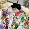 Casual Jurken Runway Zomer Vakantie Prachtige bloemenjurk Dames Stand Mouwloos Enkele rij knopen Riem Bloemenprint Lange vestidos 2024