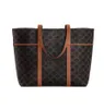 Designer Black Brown One Shoulder Handbag Women Retro stor kapacitet shoppingväskor Klassiska tryck lyxiga kohuden Högkvalitativ handhållen axelväskor