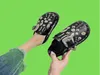 Slippels zomer dames slippers platform punk rock lederen muildieren creatieve metalen fittingen casual feestschoenen vrouwelijke buitenglaasjes t2879084