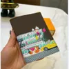 Créateurs de mode porte-monnaie femmes fermeture éclair clé pochette sac à main M62017 anneau porte-carte de crédit portefeuille toile porte-monnaie NO75iop3432 219J