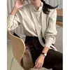 Kadınlar bluzları Superaen 2024 Koreli Şık Sonbahar Tarzı Dantel Yukarı Gevşek Kırmasız Kabarcık Kolları Düz ​​renkli Gömlek