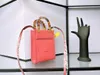 Axelväska kosmetiska fodral designers handväska på axel koppling väskor på språng crossbody shoppingväska pursar bokstäver blommor blommor ett handtag