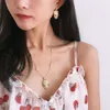 DFDF Cold Wind Green Eyed Snake Head Necklace Cool Women Trend Halsband Män koreansk utgåva Versatil Micro Inlaid Diamond Pendant Luxury Brand Style Style