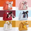 Envoltura de regalo 20 unids Bolsas de regalo de cuero de boda con cinta de arco Bolsa de embalaje Favor de Pascua Bolsas de distribuciones Eid Mubarak Candy Mini bolso T240309