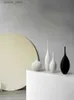 Vases Moderne minimaliste fait à la main en céramique Vase noir et blanc conception Simple à la main Art décoration salon modèle chambre Vase décor L240309