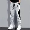 Man Pants Sweatpants Herrkläder Kvinnor Casual Jogger Streetwear Running Fashion Printed Black Grey Color Patchwork 240305