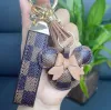 Diseñador Llavero Monedero Llavero Mini Monedero Llaveros Bolsa Monedero Colgante Cadena de Coche Encanto Bolsa de Cubo Flor Baratija Regalos Accesorios