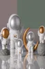 Escultura de astronauta creativa de resina nórdica, estatuilla de tienda, escritorio artesanal, accesorios de decoración del hogar, regalo de cumpleaños moderno, dibujos animados Y01072660098