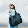 55 cm luksurysowe Projektanci torby mody mężczyźni kobiety podróżują torba skórzana torebki bagażowe duże kontrast kolorowy sport 66588226D