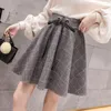 Wełniana kratona spódnica wysokiej talii Kobiet Koreańska Slim Mini Aine Lace Up Ball Suknia Autumn Winter Preppy Style Skort Female 240301