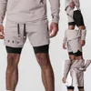 Fiess – short de sport 2 en 1 pour hommes, séchage rapide, respirant, extensible, Double couche, pour jogging, gymnastique, course à pied, entraînement, nouvelle collection