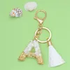 Sleutelhangers ZOSHI Prachtige 26 Letters Hars Bedels Voor Vrouwen Wit Kwastje Sleutelhangers Handtas Ornamenten Accessoires