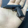 銃のおもちゃ新しい1 3合金MINI 1911ピストルモデルキーチェーンペンダントデタッチ可能な偽のおもちゃガンPUBG武器の大人の子供のための誕生日プレゼントT240309