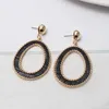 Boucles d'oreilles pendantes en cuir PU pour femmes, cadre couleur or, peau de serpent ronde, fenêtre découpée, bijoux, vente en gros, 2024