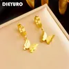 DIEYURO – boucles d'oreilles créoles en acier inoxydable 316L, couleur or, pendentif papillon pour femmes, boucle d'oreille à la mode, bijoux cadeau de fête pour filles