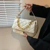 Exportation en ligne de sac à main texture et sac de style occidental pour femme printemps 2024 nouveau petit vent parfumé bandoulière Lingge polyvalent une épaule sous les bras