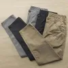 Pantalon pour homme Pantalon évacuant l'humidité Doux Respirant Décontracté Neuvième Avec Bouton Fermeture À Glissière Poches Léger Pour Le Confort