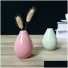 Vaser Creative Home Decoration Small Ceramic Vases Modern Simple Living Room Decor Dry Flower Dekorativa föremål Ornament Mini Vase Drop Dhkiq