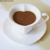 Tazze in stile europeo ceramica fantasia tazza di caffè a forma di cuore e set di piattini puro virgola bianca utensili creativi243k