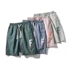 Pantaloncini sportivi Capris da spiaggia Pantaloni casual da uomo micro elastici in tinta unita