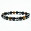 Tiger Eye Gallstone Imitation Black Agate Pärled för män och kvinnor Par Elastiskt reparmband