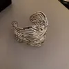 Bracciale rigido con apertura esagerata in metallo a foglia cava per donna, semplice ornamento a mano con temperamento