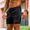 Mäns shorts manliga korta byxor som kör gym tight rosa träning joggar sport med lyx elastiskt mode i bulk