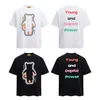 Surdimensionné Graffiti Lettre T-shirt Hommes Femmes Noir Blanc Décontracté Streetwear Coton T-shirts À Manches Courtes