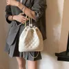 Negozio diretto in fabbrica Xiaoxiangfeng Zaino a catena per donna 2024 Nuova edizione coreana Borsa da viaggio piccola folla alla moda con coulisse