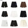 Shorts de bain d'été Maillots de bain imperméables et à séchage rapide Designer Femmes Blanc Noir Lettre colorée Shorts de plage Maillots de bain pour hommes Pantalons de natation {Catégorie}