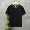 Men's T-skjortor 2024 Summer Kontrast Färg Kortärmad t-shirt Men koreansk trendstil Löst korta ärmstoppar Malekläder Q57