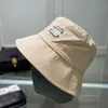 Chanells Designer Luxury channel Classico secchiello Cappello da spiaggia alla moda Cappello versatile per il tempo libero da uomo e da donna 24031001