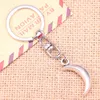 Keychains 20pcs Fashion Keychain 31x14mm Moon Pendants DIY Men Jewelry Car Key Chain Ring Holder Souvenir For Gift