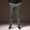 Pantalon mode couleur coloride pantalon décontracté coton slim slim épais tissu twill tissu classique de vêtements stretch stretch coréen pantalon mâle