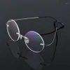 Montature per occhiali da sole alla moda Montature per occhiali in titanio rotondi retrò da uomo in metallo senza montatura super leggero miopia Nerd senza viti Eyewear1215B