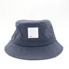 Cappello da pescatore in tela Cappelli a secchiello Etichetta in stoffa Tappo per lavabo a tesa corta Cappello parasole per esterno pieghevole