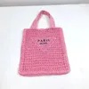 Skolväskor Spring och Summer Hollow Shoulder Tote Bag broderade bokstäver Papper Rop Straw Ladies Portable Beach Shopping