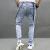 Jeans da uomo Uomo Streetwear Cinturino da motociclista strappato sottile Salopette elasticizzata da motociclista Salopette da uomo Tute Pantaloni in denim