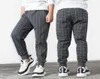 Mode Slim Fit Gris Plaid Stripe Casual Sarouel Enfants Adolescent Garçon Pantalon 4 5 6 7 8 9 10 11 12 12 14 Ans Garçons Sport Joggers2839276426