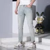 メンズジーンズ2024夏の薄いファッションラインストーンデザインストレッチスリムフィットスキニーカジュアルブランドライトブルーパンツ