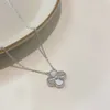 V ketting Klavertje vier laser enkele bloem hanger ketting dames puur zilver licht luxe niche sleutelbeen ketting modieuze high-end v goud dikte 18K