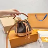 Women's bag Designer Fashion 1V Mini size 16X13X10cm color-changing leather drawstring bucket bag269U