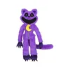 Gros créatures souriantes effrayant chat violet poupée souriant animal monstre chat violet en peluche jouet