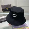 Chanells Designer Luxury channel Classico secchiello Cappello da spiaggia alla moda Cappello versatile per il tempo libero da uomo e da donna 24031001