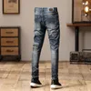 Jeans masculin 2024 a déchiré American rétro serré à la tendance droite du printemps et des pantalons d'automne hommes