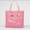 Väska för kvinnodesigner Crossbody Luxury Straw Beach Designer Tote Bag Pink Casual Summer Crochet Luxury Classic Beach Shoulder Bag Hollow Out Weave Fashion Handbag